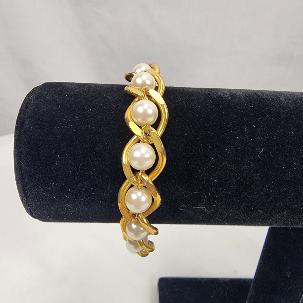 Faux Pearl and Gold Bracelet like new condition.